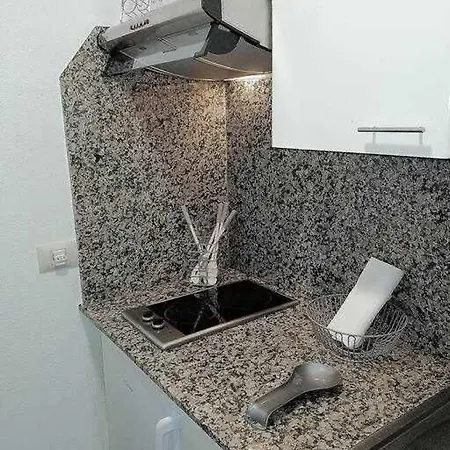 Acogedora En *